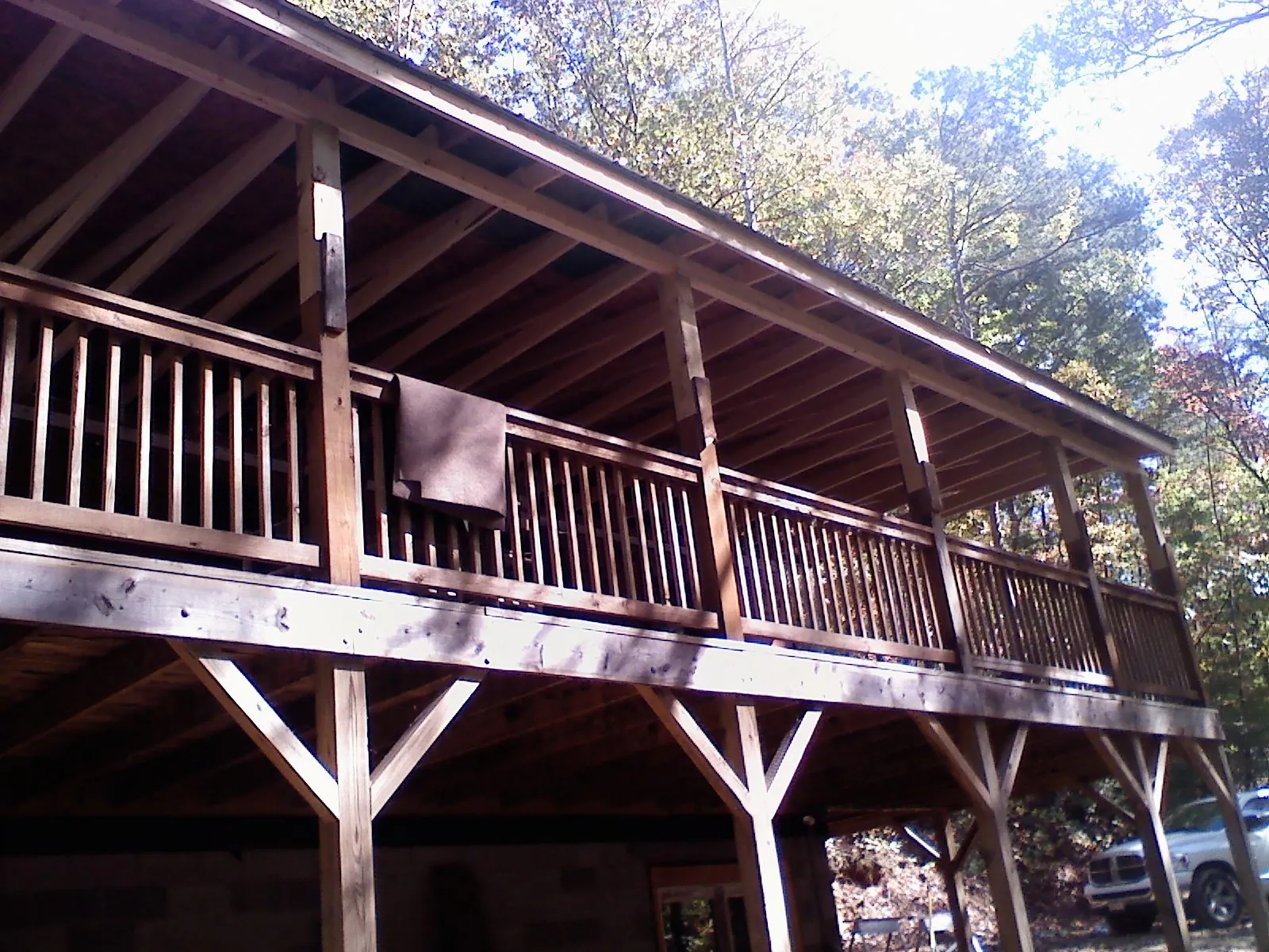 Timber framing under a new elevated porch and deck — Roof Leak Repair in East Nassau by Roofing Brothers